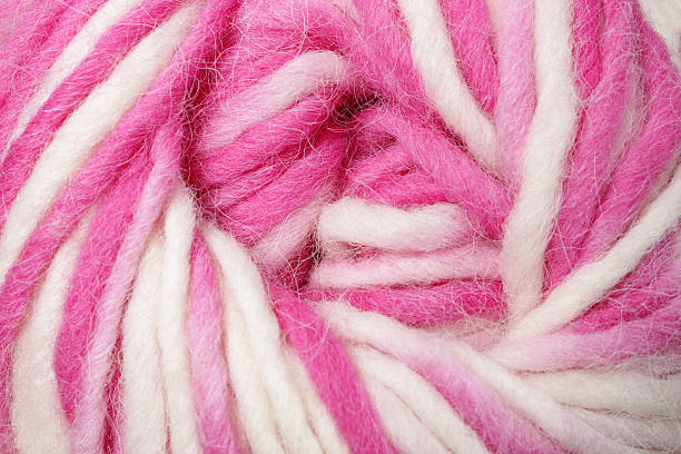 istock White and pink wool in a skein 184605071