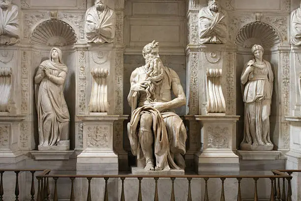"The Moses (c. 1513aa1515) is a sculpture  by the Italian High Renaissance artist Michelangelo  Buonarroti, housed in the church of San Pietro in Vincoli in Rome. Commissioned in 1505 by Pope Julius II for his tomb, it depicts the Biblical figure Moses  with horns on his head, based on a description in the Vulgate, the Latin translation of the Bible used at that time."
