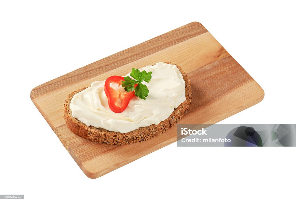 Bread and cheese spread Bread and cheese spread on a cutting board Cheese Spread Stock Photo
