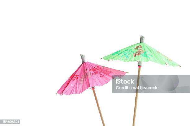 Green And Pink Open Cocktail Umbrellas Stock Photo - Download Image Now - Drink Umbrella, Paper, Color Image