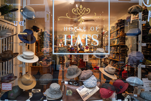 The Hague, Netherlands Nov 10, 2023 The window of a small store selling just hats, The House of Hats.