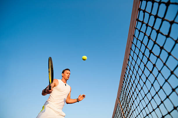 istock Tennis player against the blue sky 184606759