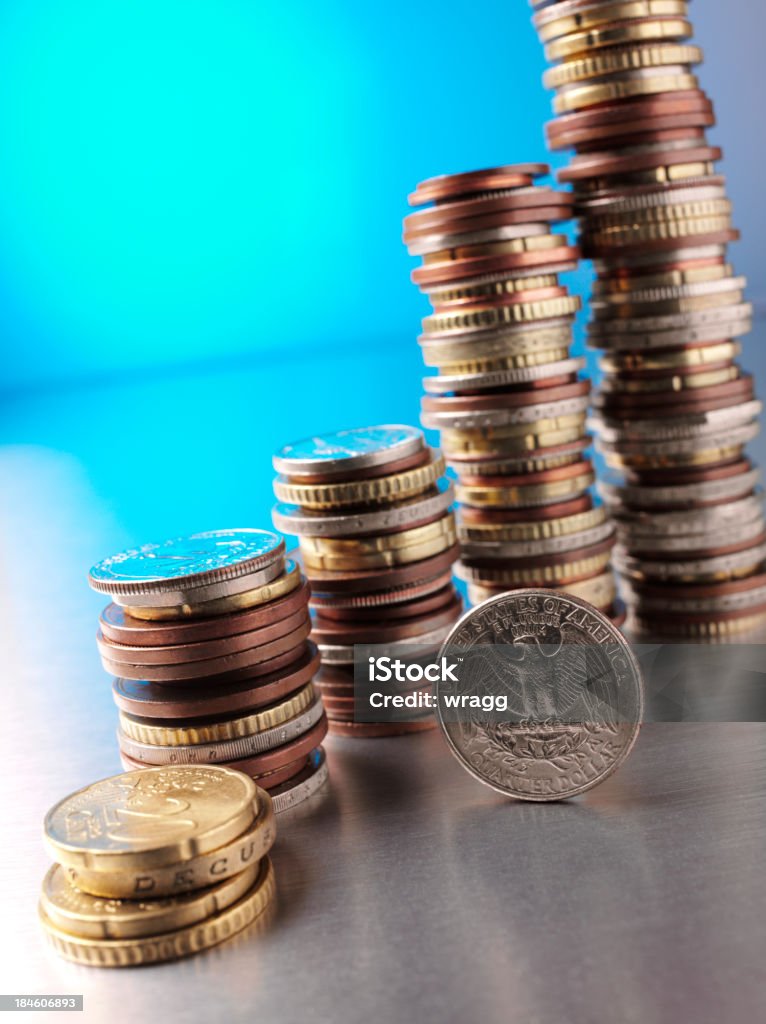 Coin Tower Towers of coins on stainless steel with copy space.You may also like these: Banking Stock Photo