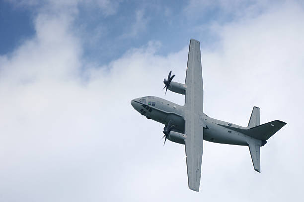 istock Military transport plane turning hard left 184607047