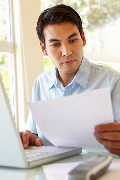 istock Filipino man working at home 184607136