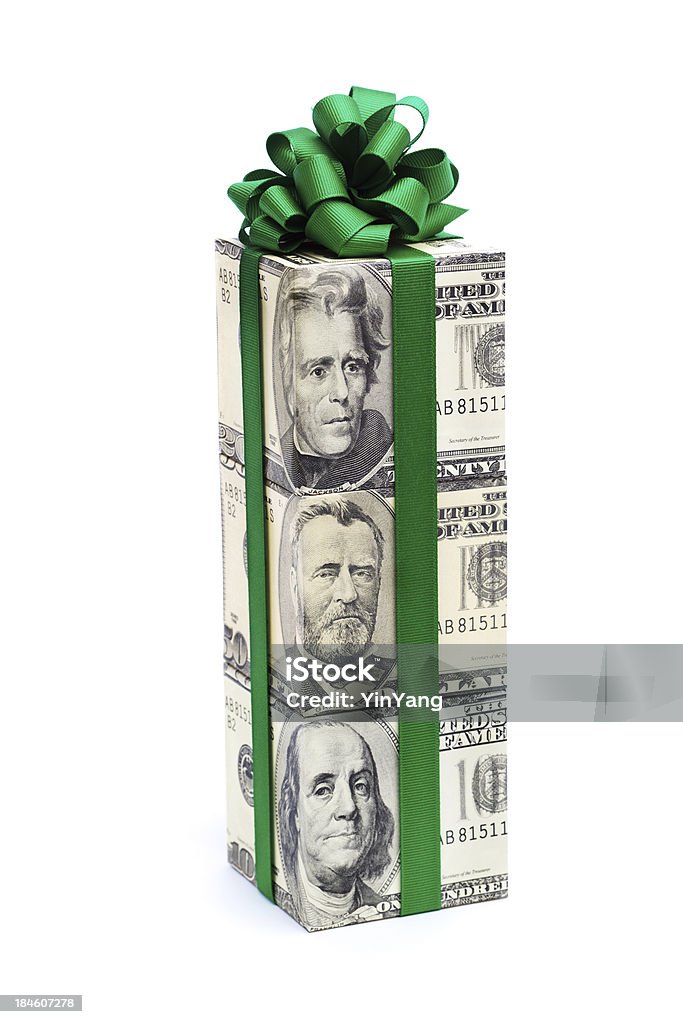 Money Gift of Dollar Bill with Green Bow on White "Subject: A group of gift packages wrapped in different U.S. dollar denominations of twenty, fifty, and hundred dollar bills, decorated with Christmas green bows. The bow colors suggest a Christmas gift or bonus. Isolated on a white background." Bonus Pay Stock Photo