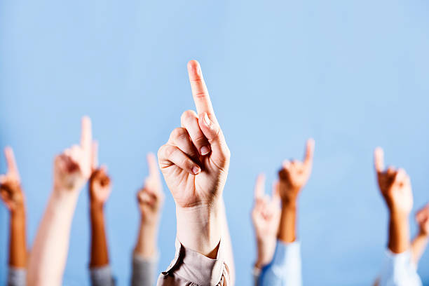 The answer's up there! Many hands point skyward