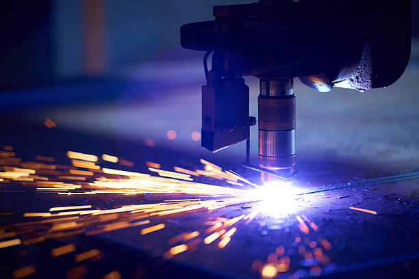 Cutting metal with plasma laser stock photo