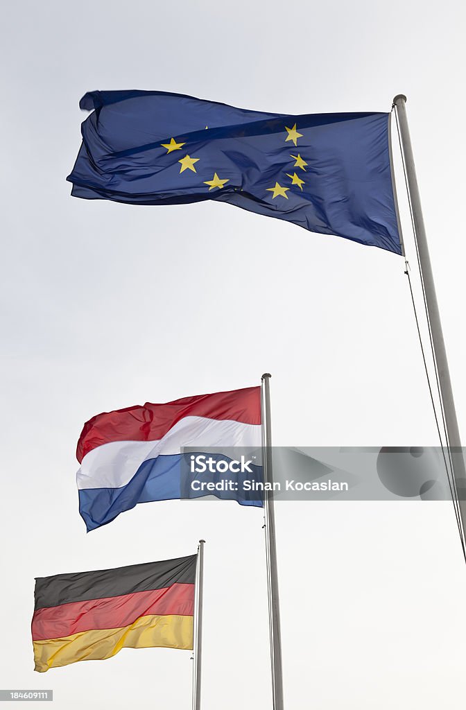 Alemães, os holandeses e a União Europeia Flags - Foto de stock de Alemanha royalty-free