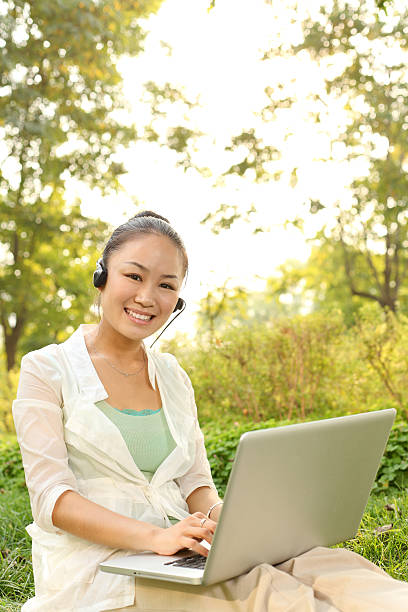 istock chinese businesswoman use laptop 184609151