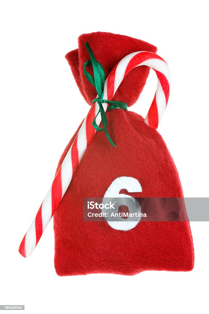 Bolsa vermelha de Natal para Calendário Adventista isolada no branco - Foto de stock de Calendário Adventista royalty-free