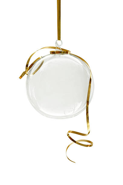 Transparent Christmas ornament hanging on a white background stock photo