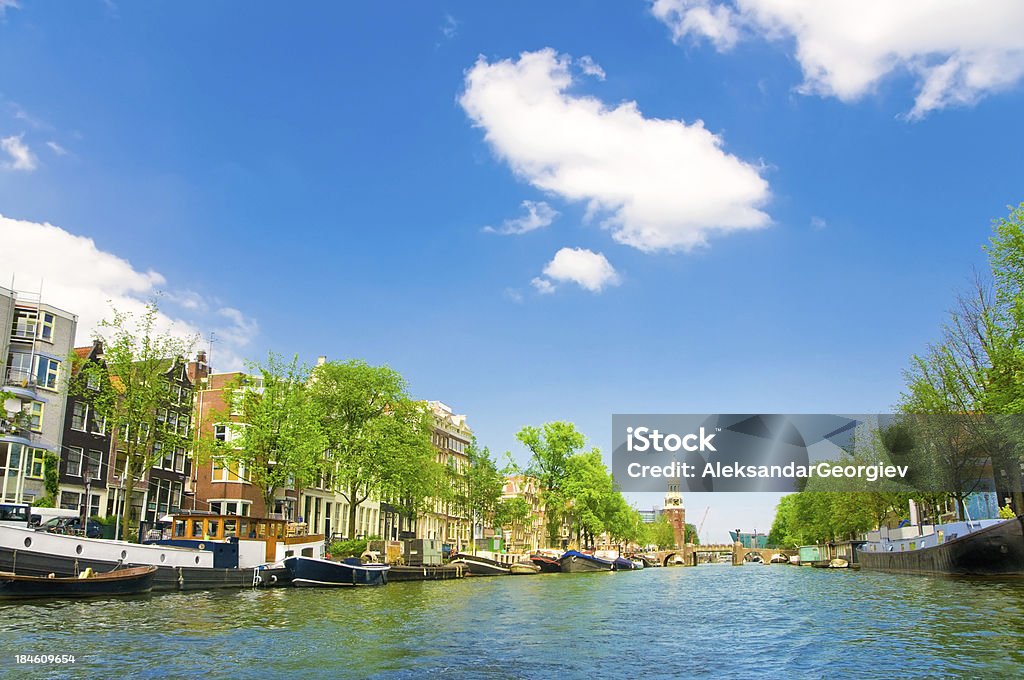 Canaux d'Amsterdam, à la tour Munttoren (Centrum) - Photo de Amsterdam libre de droits