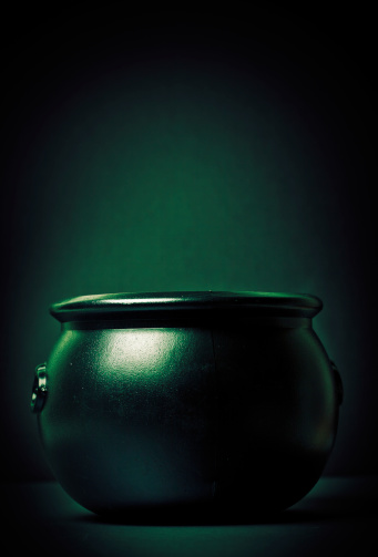 Low lit black pot with good copy space.