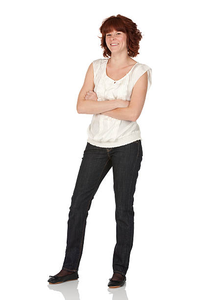 istock Happy woman stading with her arms crossed 184610184