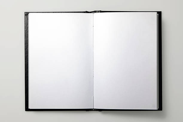 istock An open book with black pages on a white background 184610217