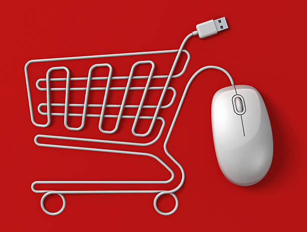 Computer mouse shopping cart stock photo