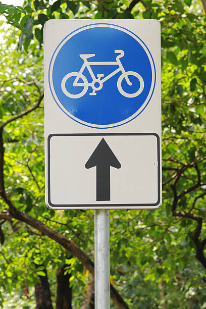 istock Road sign, bicycle lane in park 184610621