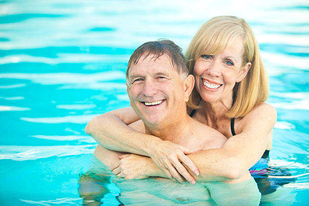 istock Senior Couple in Pool 184610727