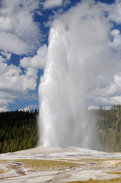istock Old Faithful Geyser on a Partly Cloudy Day 184610890