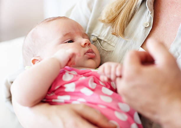 istock Baby with mother 184610899