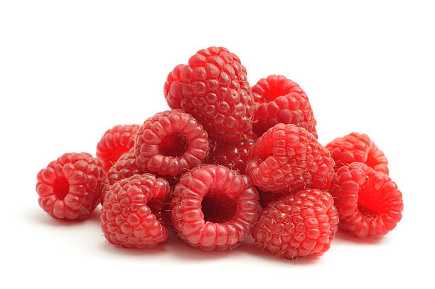 Bunch of raspberries on white background Raspberries freshly picked from the garden, isolated on a white background. red berries stock pictures, royalty-free photos & images