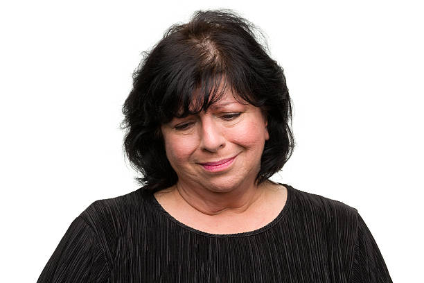 istock Sad Woman Smiling in Regret 184611174