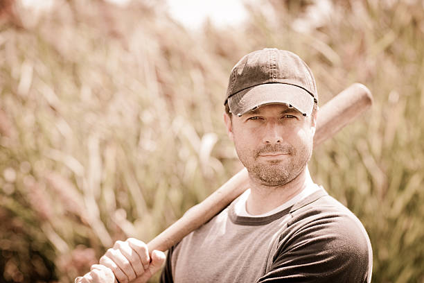 Vintage Baseball Player in Batting Stance with Bat