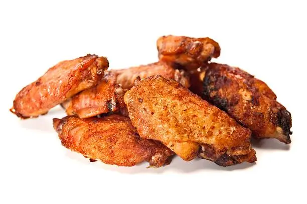 Photo of Fried chicken wings on a white background