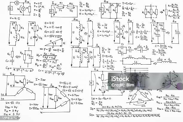 Hand Written Formulas Of Electrotechnics And Electronics On White Background Stock Photo - Download Image Now