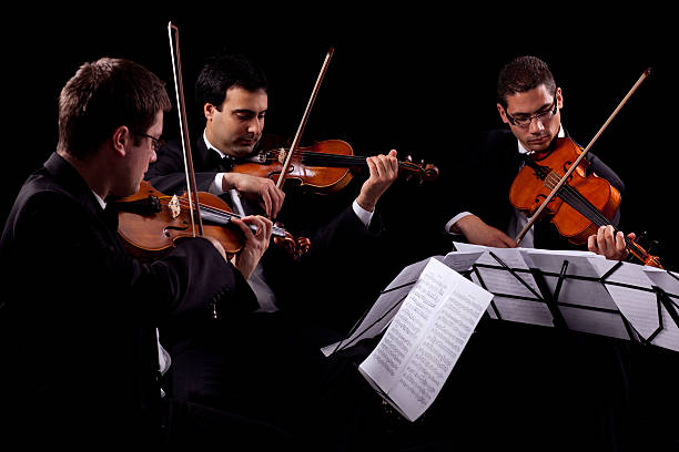istock Violin and violoncello players 184612758