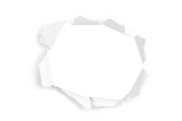 istock A piece of white paper with a hole torn through the middle 184613719