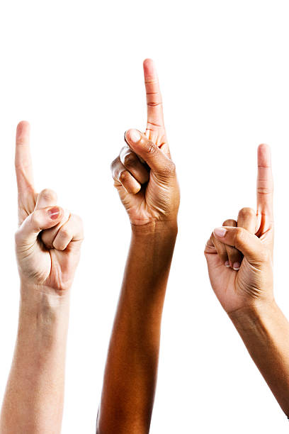 istock Pointing up to heaven, three mixed female hands 184613759