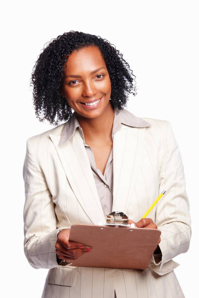 istock Woman writing on clipboard 184614430