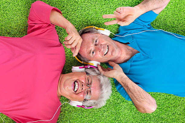 istock seniors having fun with good music 184614561