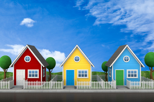 Street view of a stylized neighborhood with picket fences.Could be a useful element in a real estate or navigation composition.This is a detailed 3d rendering.