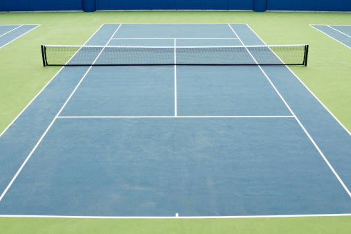 A blue and green tennis court.