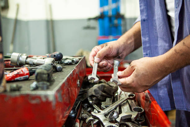 istock Unidentified person's hands taking wrenches out of toolbox 1846151242