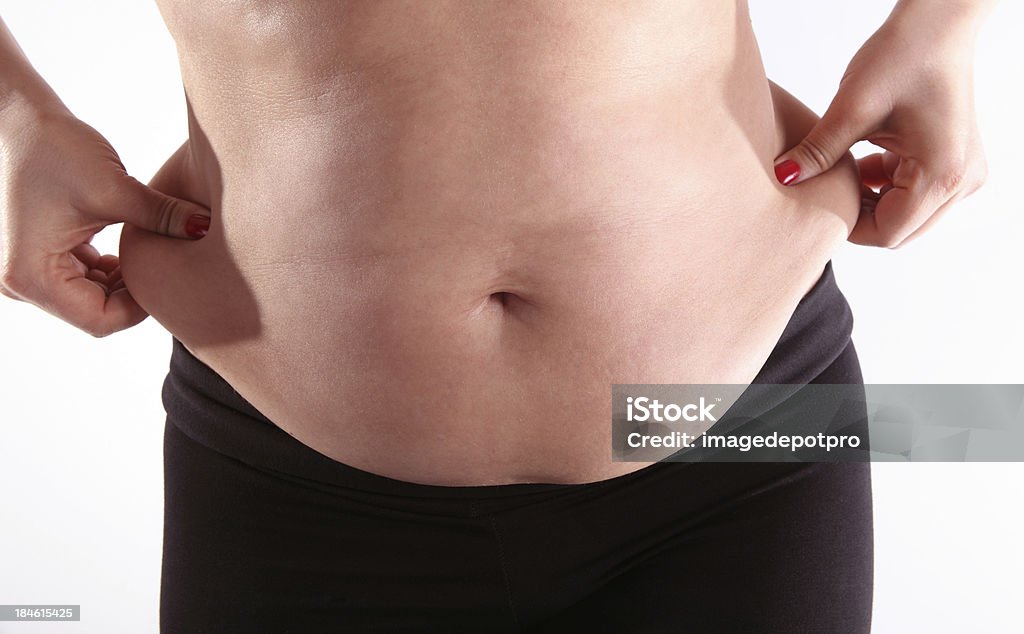 Pancia grassa di donna - Foto stock royalty-free di Addome