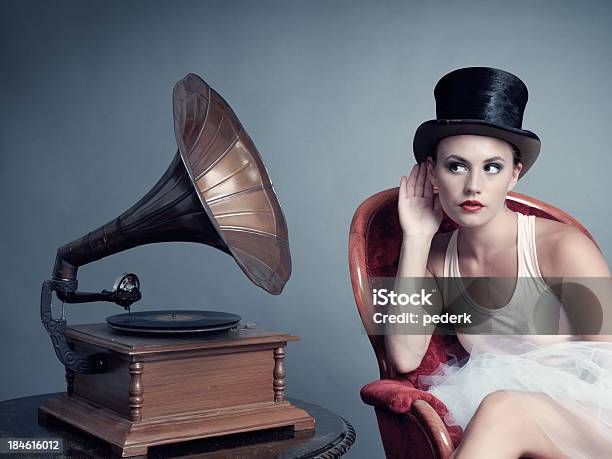 Woman Listening To Music Stock Photo - Download Image Now - Adult, Adults Only, Arts Culture and Entertainment