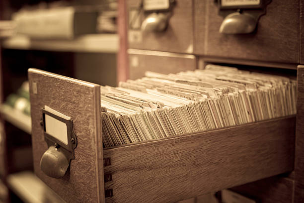 Archive Antique wooden storage boxes in a Archive  filing cabinet stock pictures, royalty-free photos & images