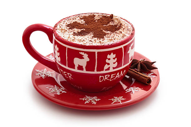 Hot chocolate in red seasonal mug with cocoa snowflake