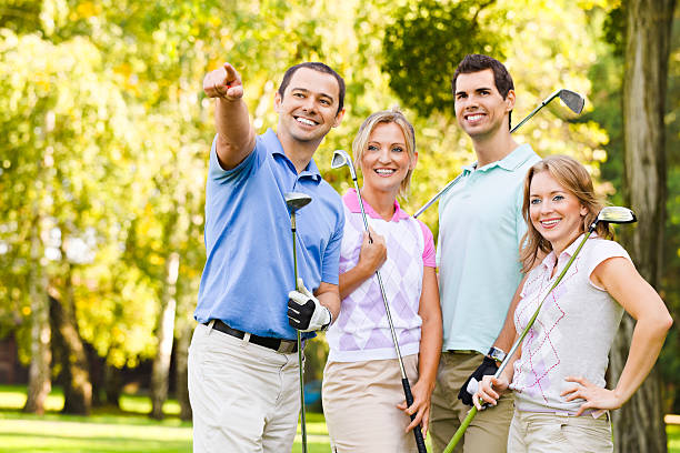 istock Sport series: friends holding golf clubs 184616886