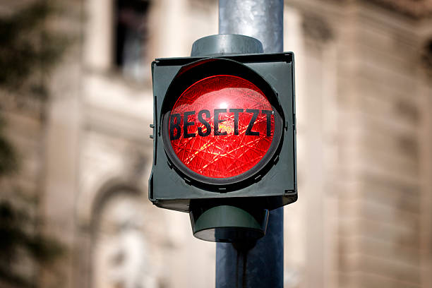 istock Red traffic light in front of parking garage 184616982