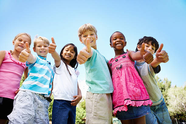istock Multiracial children showing thumbs up 184617191