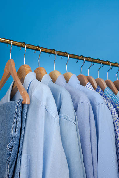 istock Mens Blue Shirts On Hangers 184617256