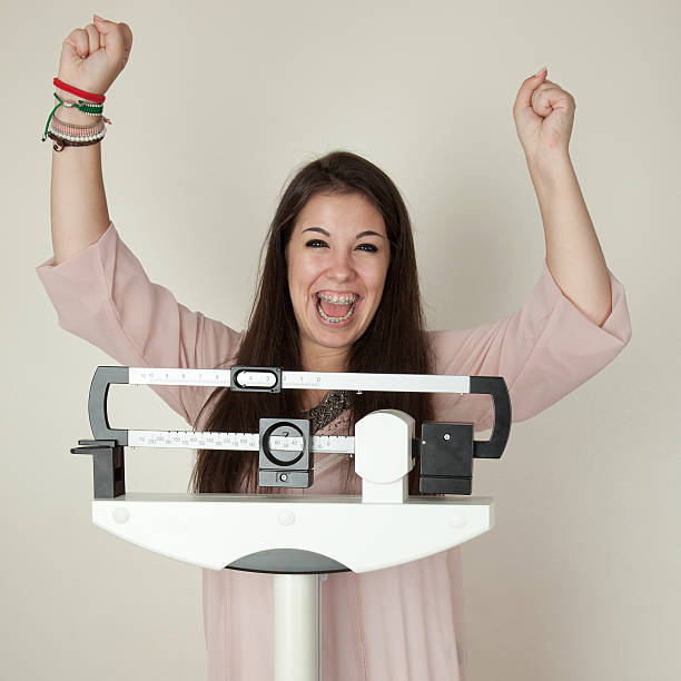 istock Celebrating weight loss 184617996