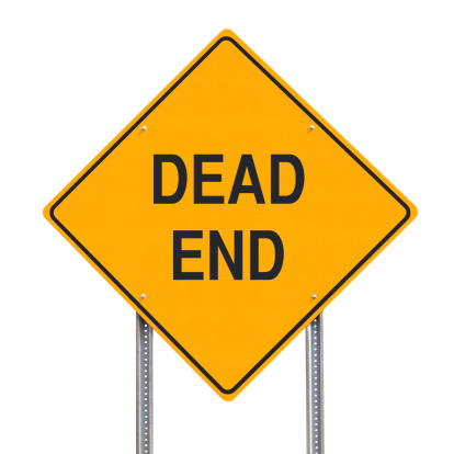 Conceptual road sign indicating a dead end ahead - isolated on white