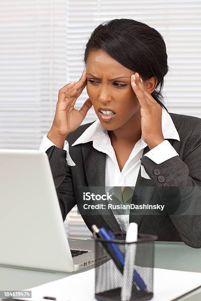 Businesswoman With Headache Stock Photo - Download Image Now - 20-29 Years, Adult, Adults Only