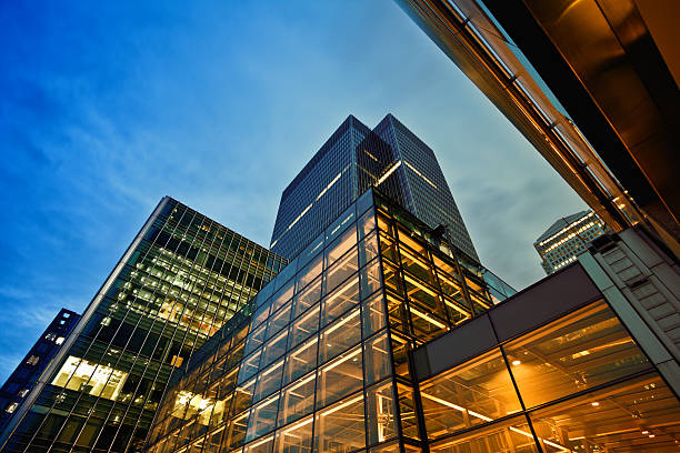 Business District at Dusk, London Canary Wharf at night office block exterior stock pictures, royalty-free photos & images